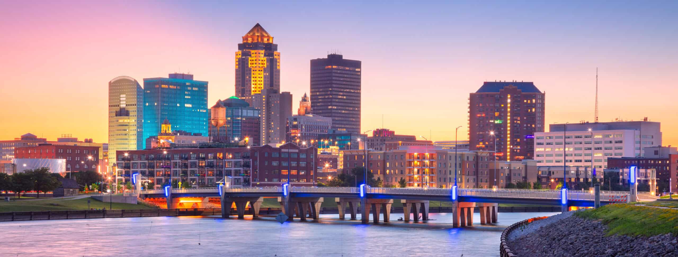 Cityscape image of Des Moines skyline, Iowa, USA at summer sunset. American Computer Services Headquarters