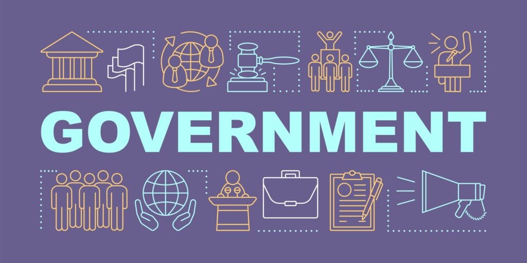 Government in light blue text on a purple background surrounded by different small shapes representing types of government demonstrating American Computer Services' expertise in multiple State Government sectors